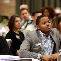 Students listen intently to a storyteller